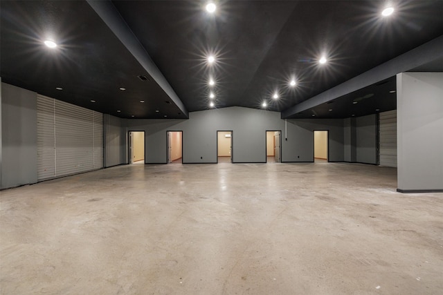 interior space with baseboards and recessed lighting