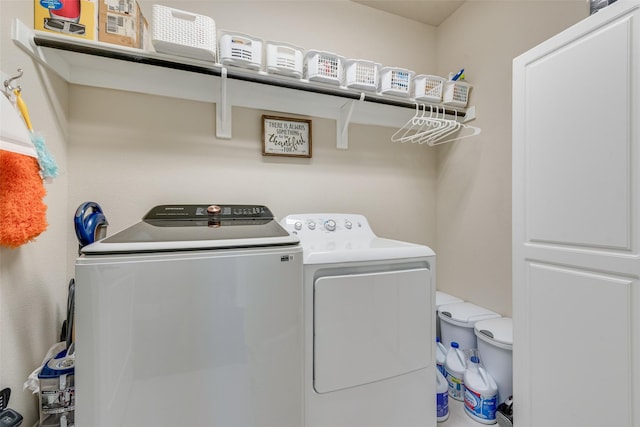 781 Bosley Dr, Fate, TX 75087 - laundry area with washer and clothes dryer