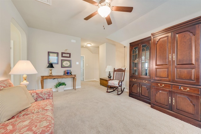 781 Bosley Dr, Fate, TX 75087 - living area featuring light colored carpet, a ceiling fan, and baseboards
