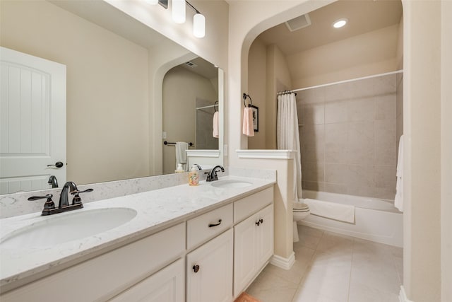 781 Bosley Dr, Fate, TX 75087 - full bath featuring tile patterned floors, toilet, double vanity, and shower / bathtub combination with curtain
