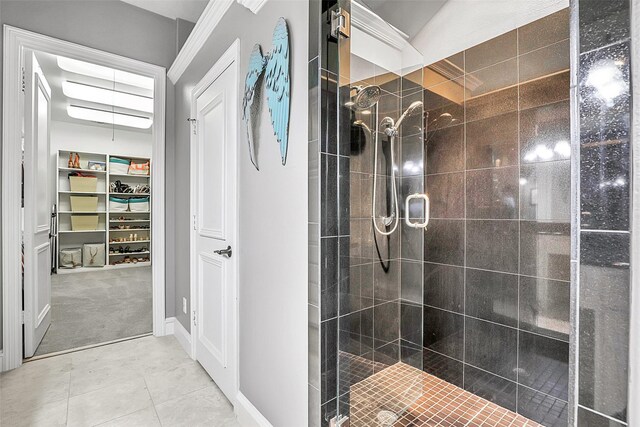 10040 Little Horn Cir, Frisco, TX 75035 - bathroom with a shower stall, tile patterned flooring, and a walk in closet