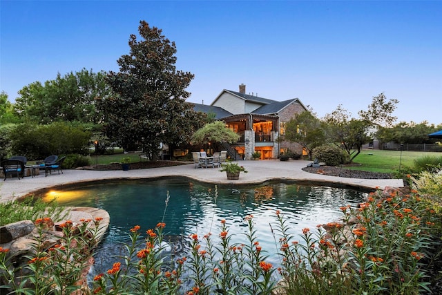 10040 Little Horn Cir, Frisco, TX 75035 - outdoor pool featuring a patio area