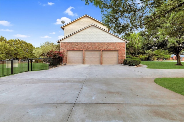 10040 Little Horn Cir, Frisco, TX 75035 - view of side of home featuring driveway and brick siding