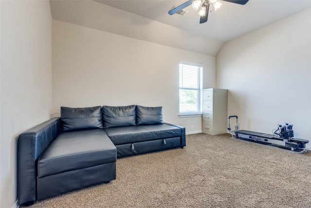 carpeted living room featuring vaulted ceiling, visible vents, baseboards, and a ceiling fan