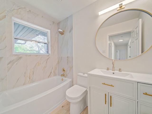 bathroom with toilet, vanity, and shower / tub combination