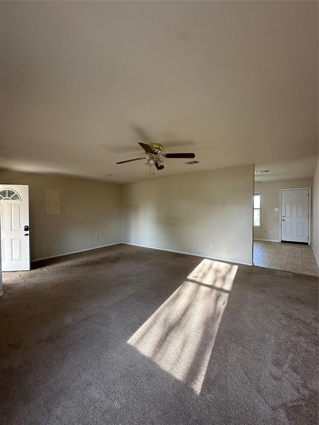 510 Green Acres Rd, Weatherford, TX 76088 - empty room with visible vents, baseboards, a ceiling fan, and carpet flooring