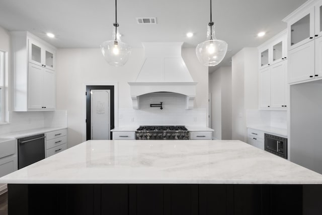 109 Post Oak Cv, Sunset, TX 76270 - kitchen with custom exhaust hood, a large island, recessed lighting, black dishwasher, and visible vents