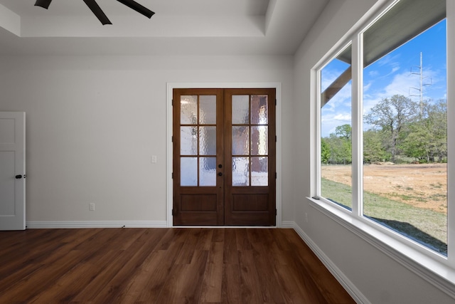 109 Post Oak Cv, Sunset, TX 76270 - doorway with dark wood-style flooring, baseboards, french doors, and a healthy amount of sunlight