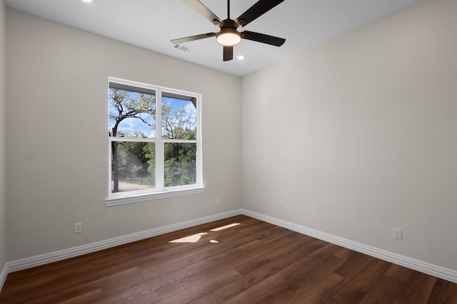 109 Post Oak Cv, Sunset, TX 76270 - empty room with dark wood-style flooring, baseboards, visible vents, and recessed lighting