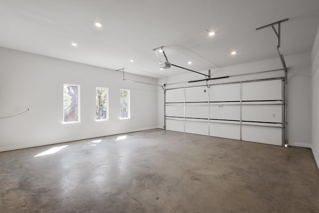 109 Post Oak Cv, Sunset, TX 76270 - garage featuring recessed lighting, baseboards, and a garage door opener