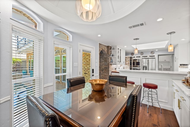 dining area featuring recessed lighting, visible vents, and dark wood-style floors