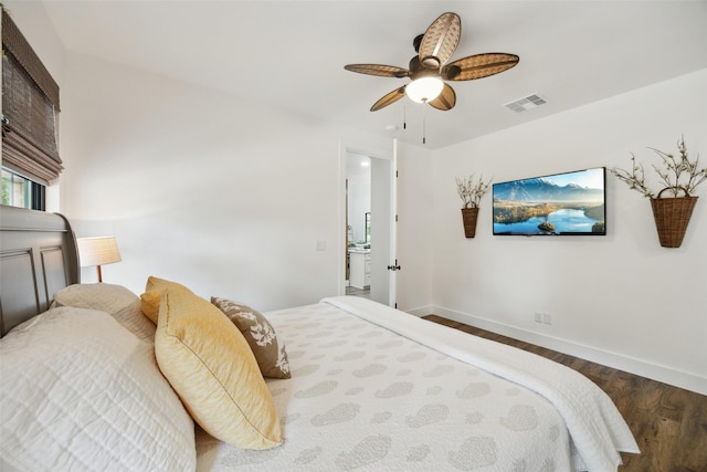 bedroom featuring wood finished floors, baseboards, a ceiling fan, and visible vents