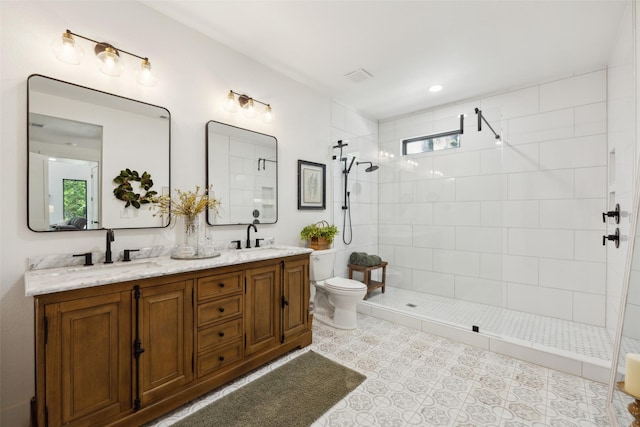 full bathroom with a sink, toilet, and walk in shower