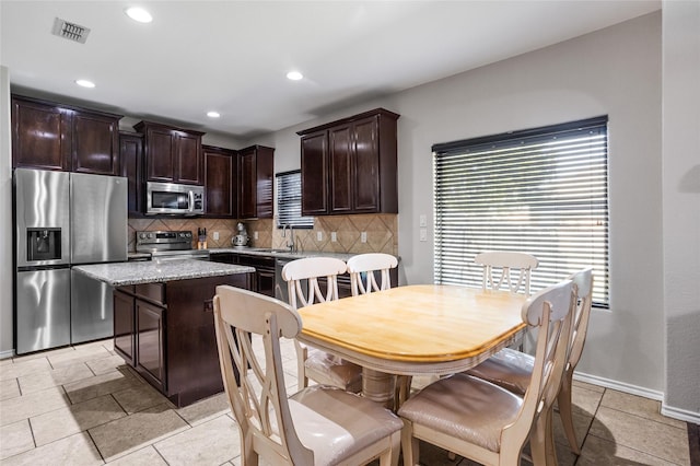 8312 White Hart Dr, Fort Worth, TX 76179 - dining room with recessed lighting, visible vents, and baseboards