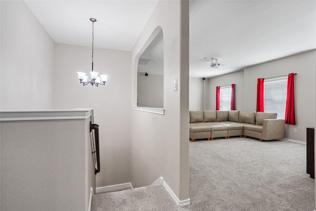 8312 White Hart Dr, Fort Worth, TX 76179 - stairs featuring a chandelier, baseboards, arched walkways, and carpet