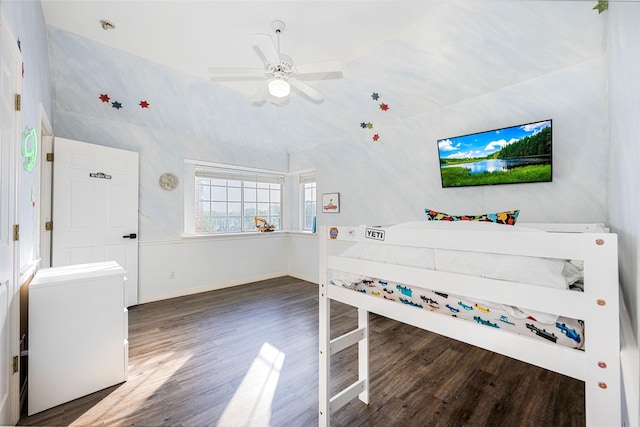 unfurnished bedroom with baseboards, a ceiling fan, and wood finished floors