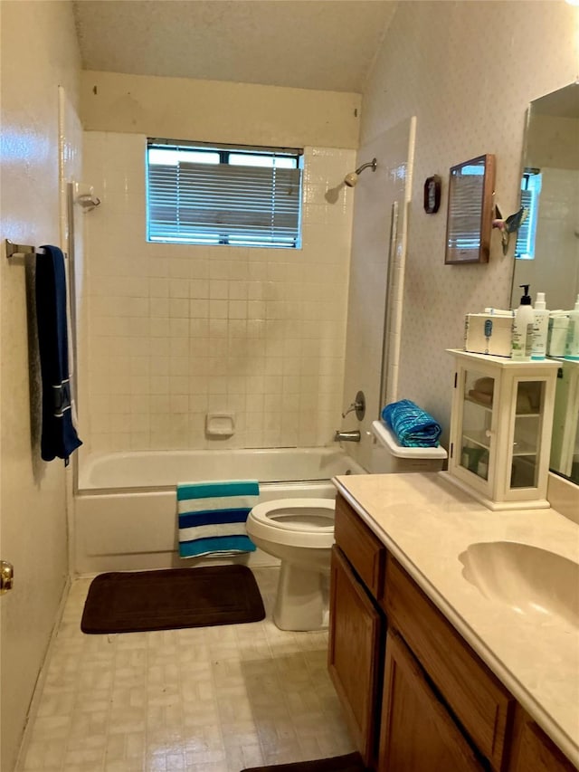 612 Desoto Dr, Desoto, TX 75115 - bathroom featuring toilet, vanity, and shower / washtub combination