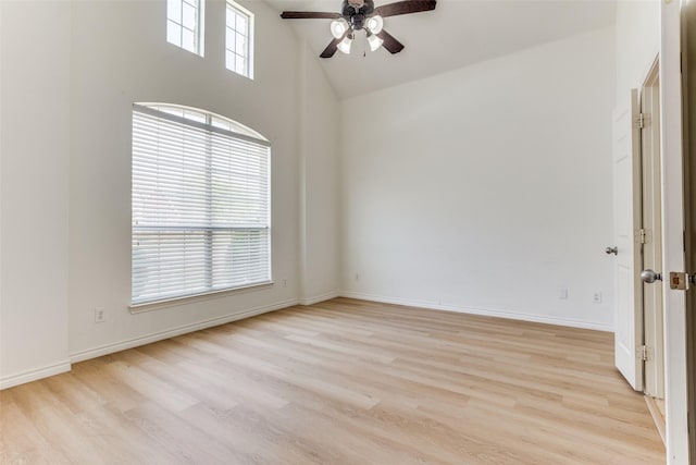 610 Crockett Dr, Lavon, TX 75166 - empty room with high vaulted ceiling, light wood-type flooring, baseboards, and ceiling fan