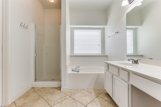 610 Crockett Dr, Lavon, TX 75166 - bathroom with vanity, tile patterned flooring, a stall shower, and a garden tub