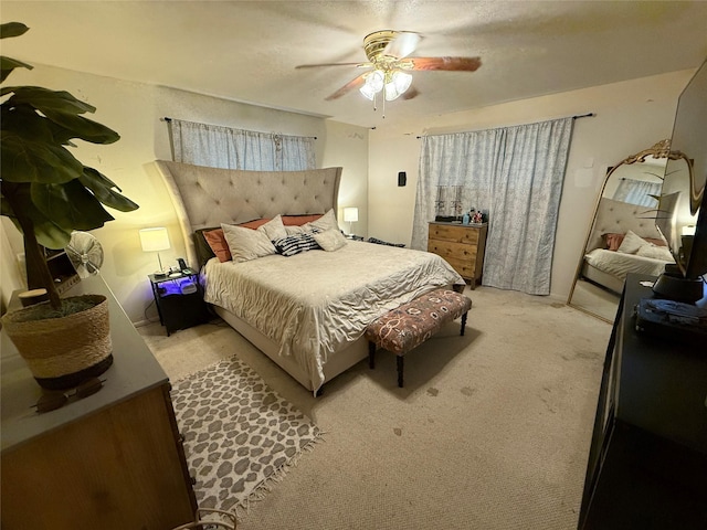 2909 Oakridge Dr, Corsicana, TX 75110 - bedroom featuring light carpet and ceiling fan