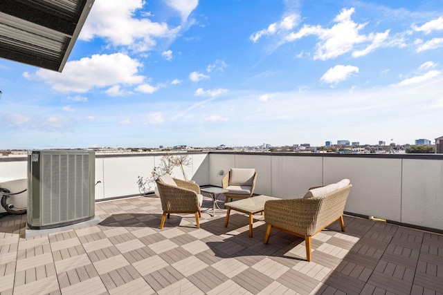 view of patio / terrace with central AC unit and an outdoor hangout area