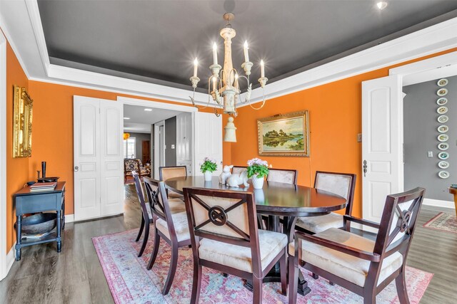 6126 Averill Way Unit 203W, Dallas, TX 75225 - living area featuring crown molding, baseboards, wood finished floors, and visible vents