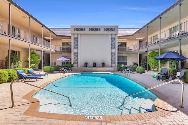 6126 Averill Way Unit 203W, Dallas, TX 75225 - pool with a patio