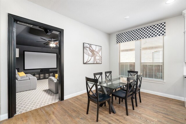 1128 Ellicott Dr, Celina, TX 75009 - dining space with wood finished floors, ceiling fan, baseboards, and recessed lighting