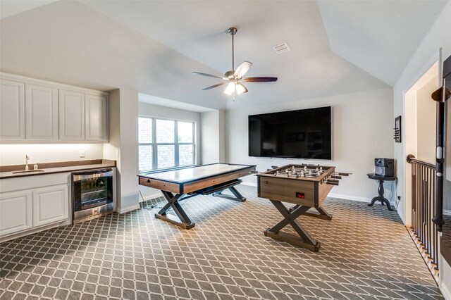 1128 Ellicott Dr, Celina, TX 75009 - playroom featuring wine cooler, carpet flooring, bar with sink, lofted ceiling, and a ceiling fan