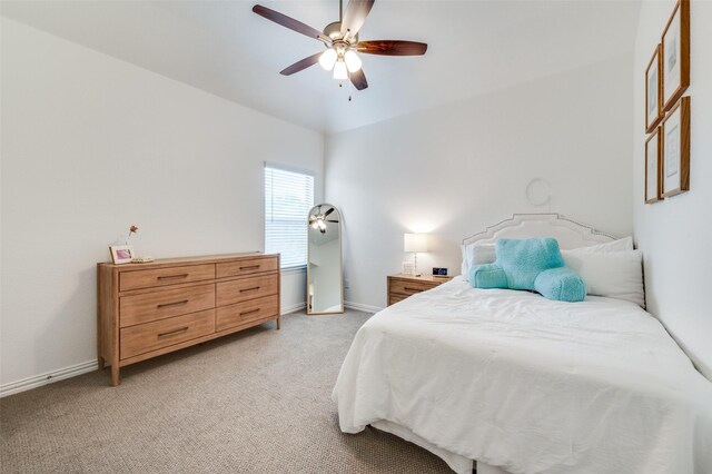 1128 Ellicott Dr, Celina, TX 75009 - bedroom with light colored carpet, baseboards, and a ceiling fan