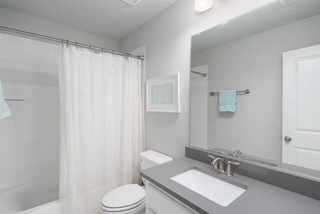 1128 Ellicott Dr, Celina, TX 75009 - full bathroom featuring toilet, shower / bathtub combination with curtain, and vanity