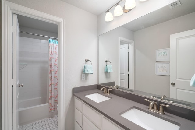 1128 Ellicott Dr, Celina, TX 75009 - full bath featuring shower / tub combo with curtain, double vanity, and tile patterned floors