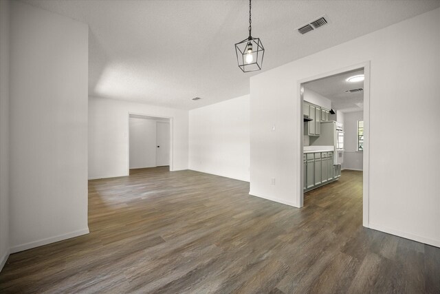 6516 Welch Ave, Fort Worth, TX 76133 - unfurnished room featuring dark wood-type flooring and baseboards