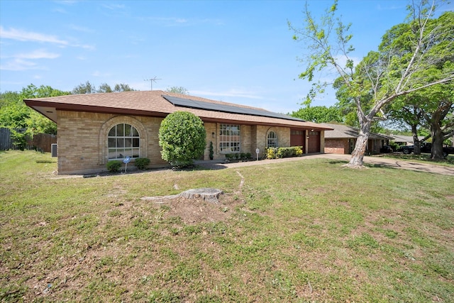 6516 Welch Ave, Fort Worth, TX 76133 - single story home with an attached garage, solar panels, brick siding, concrete driveway, and roof with shingles