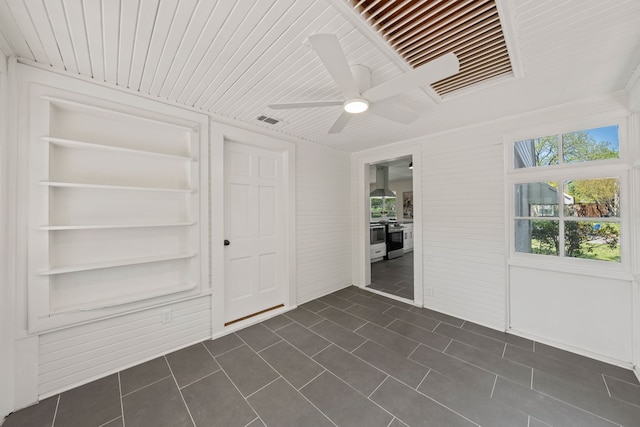 unfurnished sunroom with visible vents