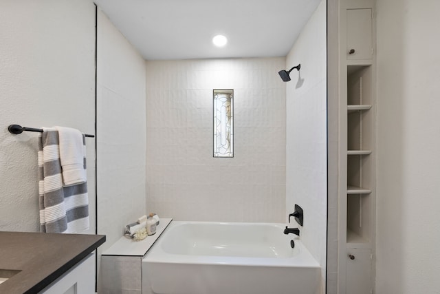 full bathroom featuring vanity and washtub / shower combination
