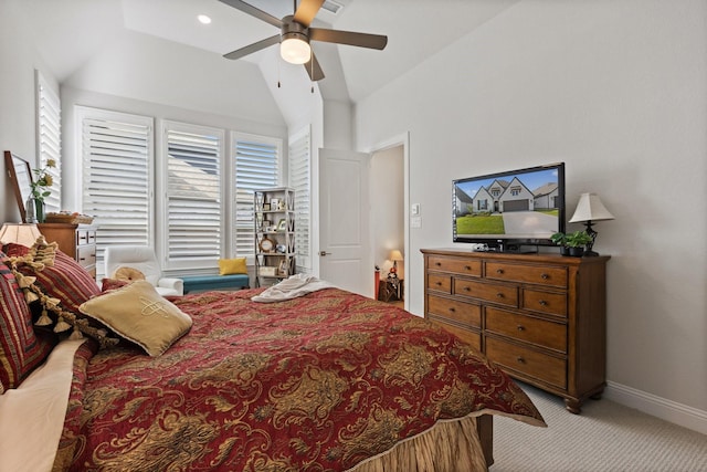 bedroom featuring light carpet, a ceiling fan, lofted ceiling, and baseboards