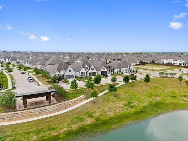 aerial view featuring a residential view and a water view
