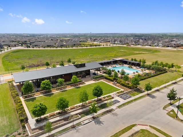 birds eye view of property with a residential view
