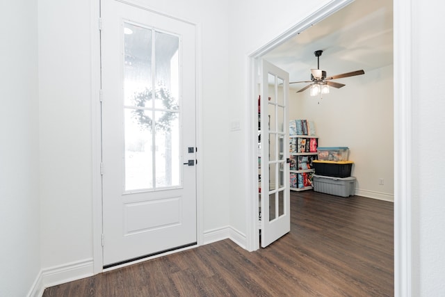 foyer with french doors, dark wood-style flooring, baseboards, and a ceiling fan