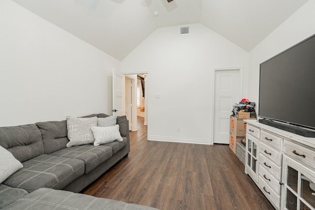 living area featuring visible vents, baseboards, ceiling fan, dark wood finished floors, and high vaulted ceiling