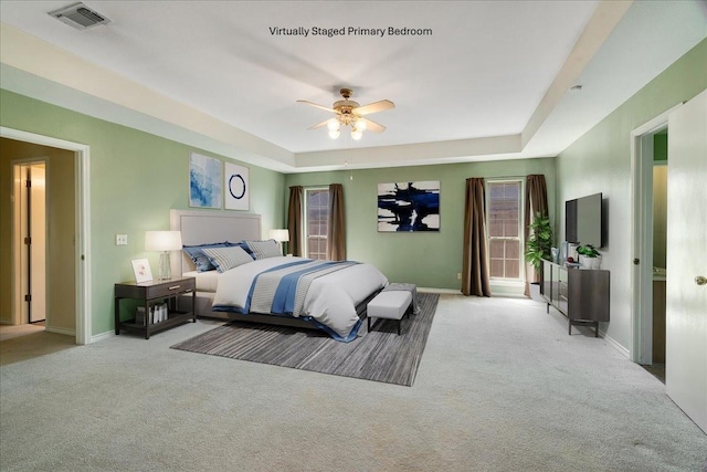 bedroom with baseboards, visible vents, and carpet floors