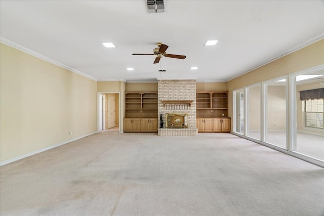 unfurnished living room featuring visible vents, baseboards, a brick fireplace, ornamental molding, and a ceiling fan
