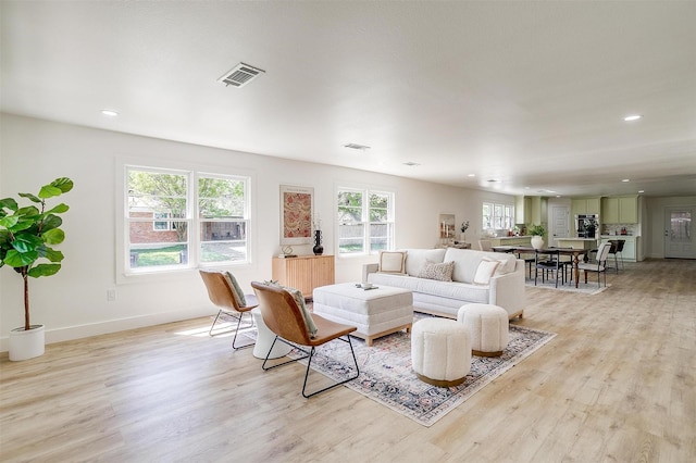 5440 Fursman Ave, Fort Worth, TX 76114 - living area featuring recessed lighting, visible vents, light wood finished floors, and baseboards