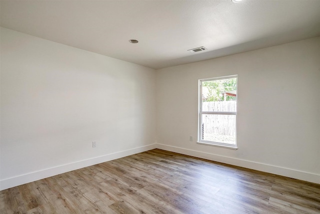 5440 Fursman Ave, Fort Worth, TX 76114 - empty room featuring recessed lighting, visible vents, baseboards, and wood finished floors