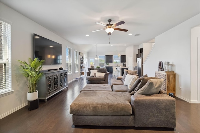 living area featuring ceiling fan, recessed lighting, baseboards, and dark wood-style floors