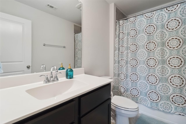 bathroom with vanity, visible vents, curtained shower, and toilet