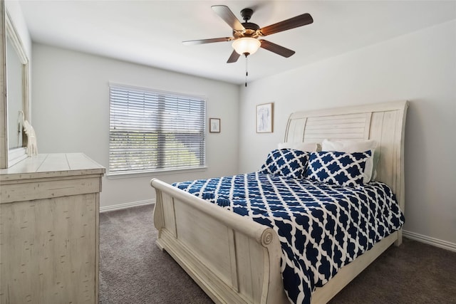 carpeted bedroom with baseboards and ceiling fan