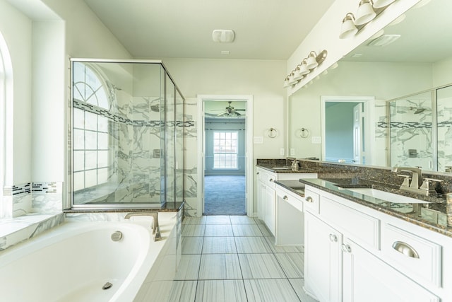 full bath with a shower stall, a garden tub, a sink, and ceiling fan