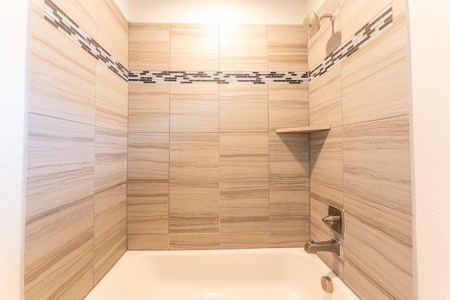 bathroom with shower / bathtub combination